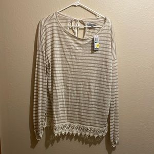 Large Olivia Sky shirt. Never been worn. New with tags!!!